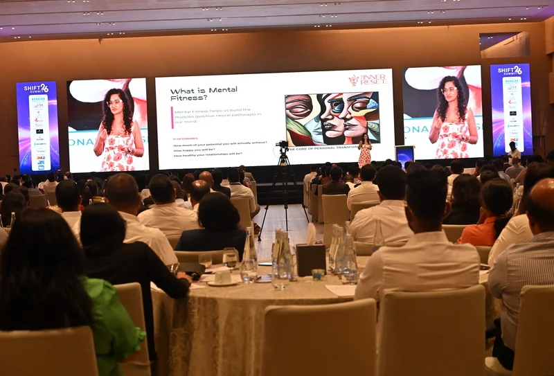 Mastani presenting a workshop on a stage